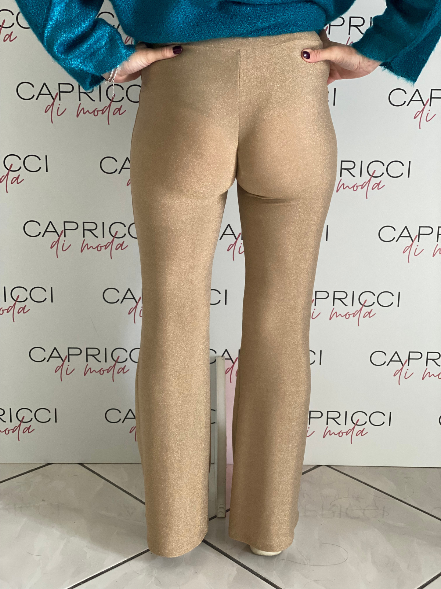 Pantalone a zampa elasticizzato in lurex