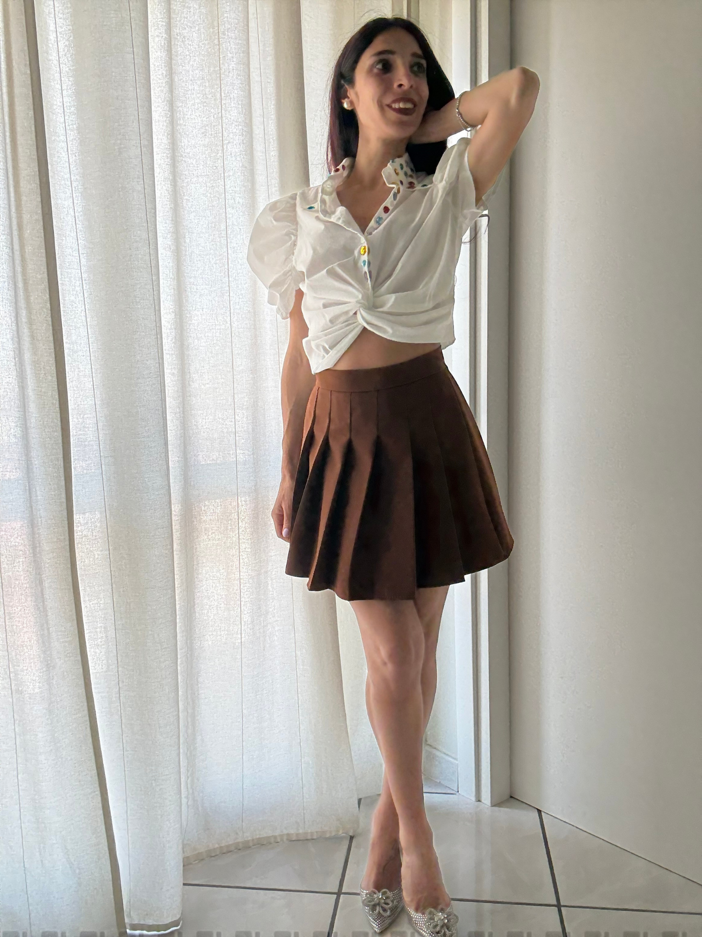 Gonna Corta Plissettata con Zip sul Retro