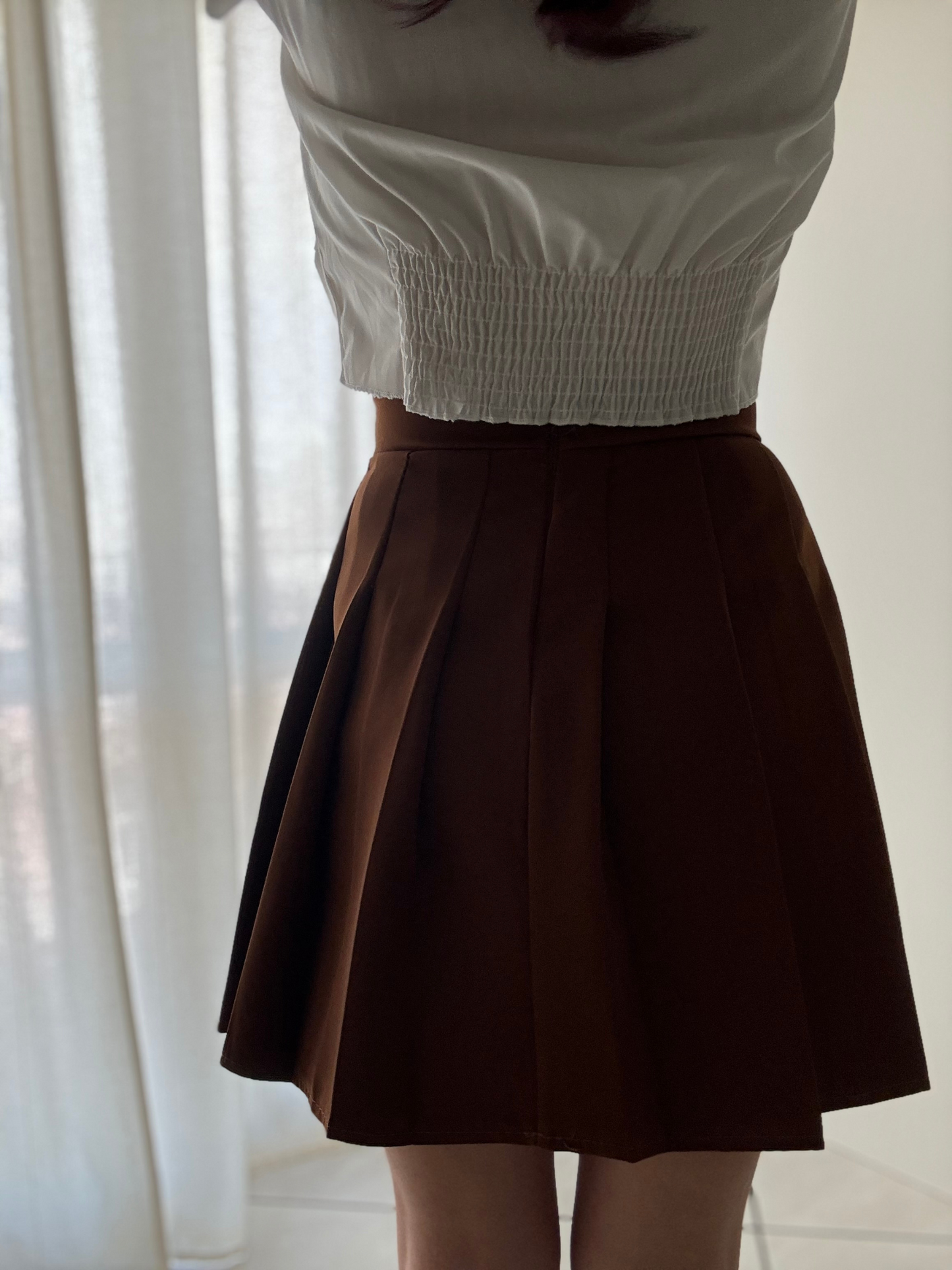 Gonna Corta Plissettata con Zip sul Retro